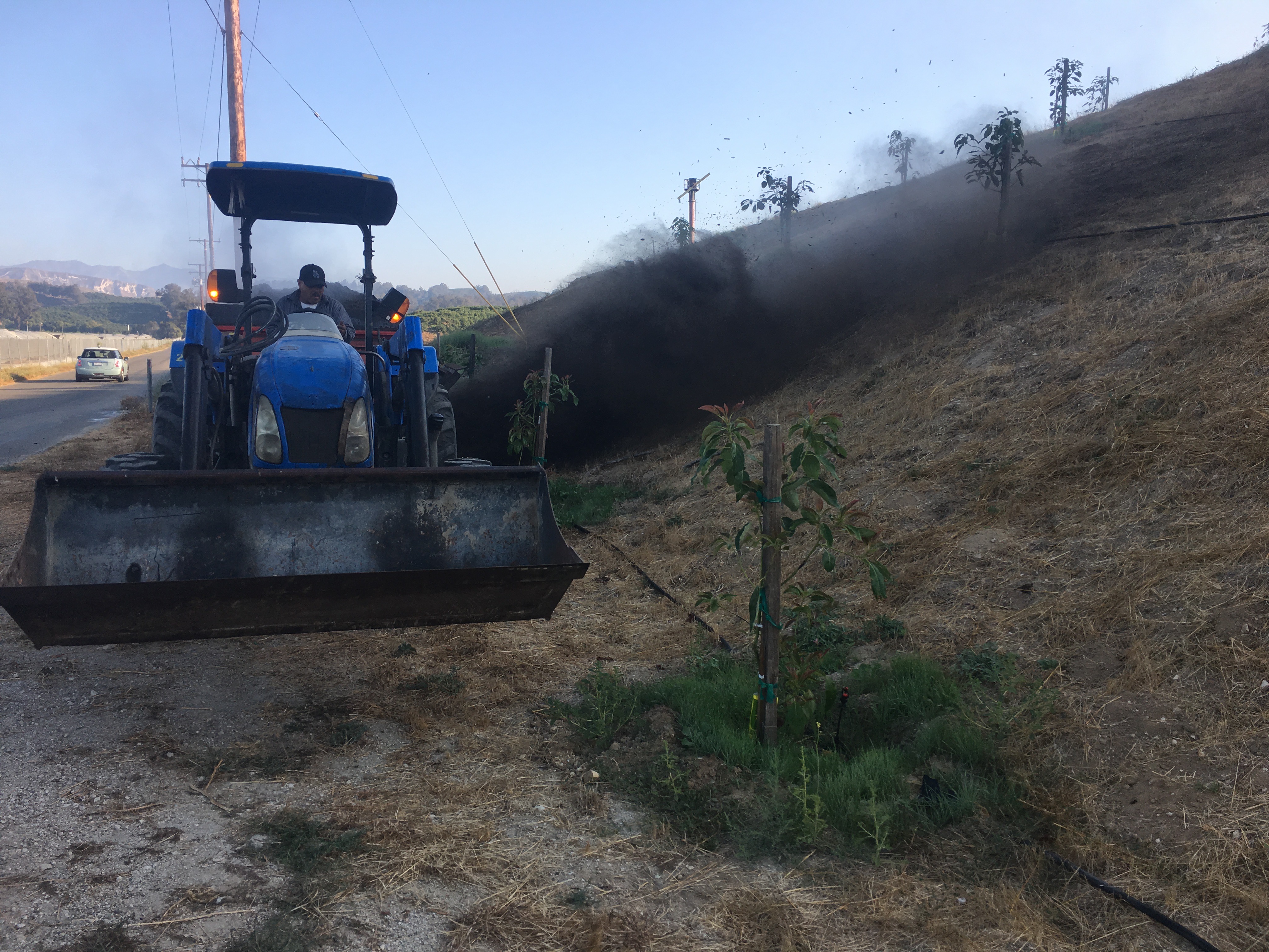 hillside mulch spreading